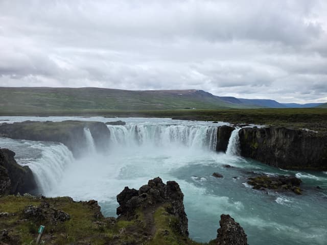 The wide horseshoe falls of Goðafoss